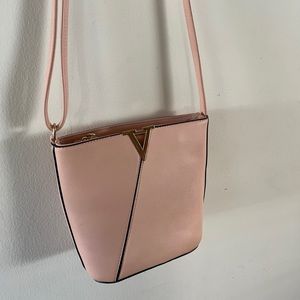 Small pink crossbody bucket bag